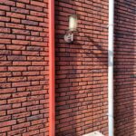 Goot mee gespoten in kleur van bakstenen. Afbeelding 2