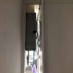 Verticale inbouwunit Invisible Airco weggewerkt in de muur. Afbeelding 1