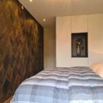 Verticale inbouwunit Invisible Airco weggewerkt in de muur. Afbeelding 2