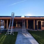 Blok hut van een waterdichten dakbedekking voorzien Afbeelding 1