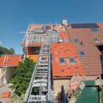 4 woningen voorzien van nieuwe dakpannen Afbeelding 1