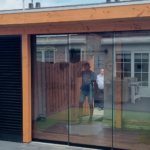 Veranda met een glazenschuifwand-systeem Afbeelding 1