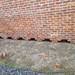 Spouwmuurisolatie met EPS parels en verwijderen spouwvervuiling Afbeelding 1