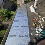 Plat dak houtrot en isolatie vervangen Afbeelding 1