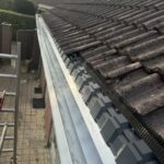 Zinken dakgoten + regenpijpen + vogelwerende dakprofielen Afbeelding 1