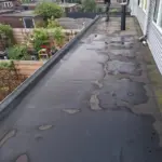 Plat dak weer als nieuw met een verse laag bitumen! 🏠 Afbeelding 1