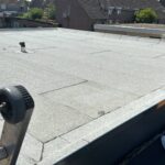 Plat dakrenovatie bitumen en boeiboorden Afbeelding 1