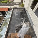 Oud epdm dak omgetoverd naar bitumen dak met afschot! Afbeelding 1