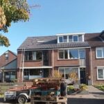2 woningen voorzien van compleet nieuwe pannendak Afbeelding 1