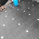 Bitumem dak voorzien van nieuwe dakbeddeking Afbeelding 1